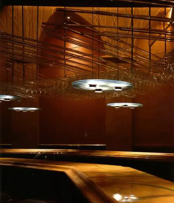 80’s dance club with lit lucite, jungle wall murals and aurora bar lighting - Banana Max nigtht Club interior designed by Carolyn Robbins