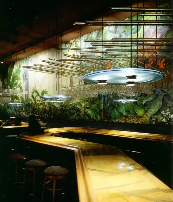 80’s dance club with lit lucite, jungle wall murals and aurora bar lighting - Banana Max nigtht Club interior designed by Carolyn Robbins
