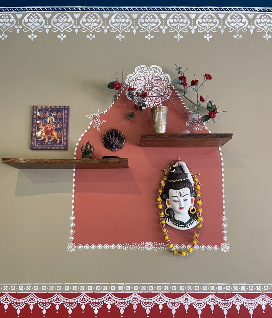 Indian decor using festive feel with hand stenciling in bright color - Avatar’s interiors designed by Carolyn Robbins