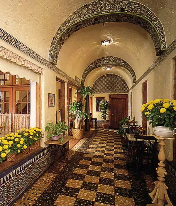 Place St. Michel Hotel interior design by Carolyn Robbins. One of a kind boutique rooms with a Victorian flare.