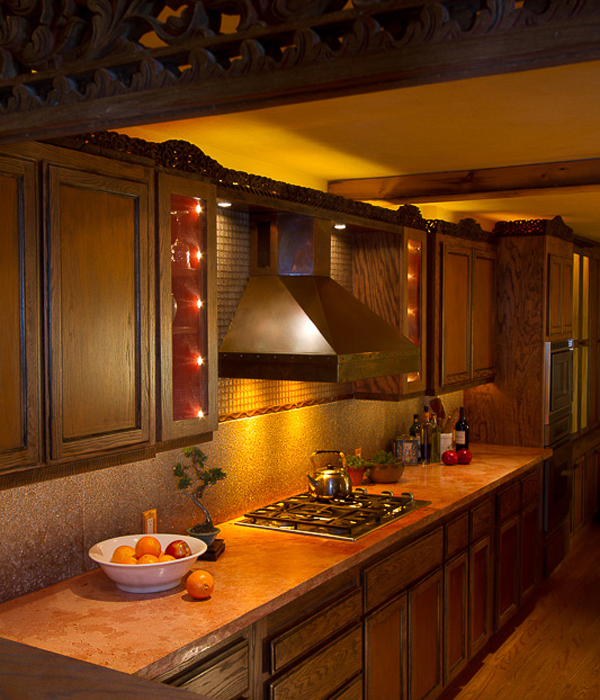 Warm kitchen details in copper tones and broken glass mosaic - Heeb Interior design by Carolyn Robbins