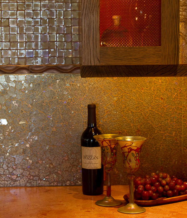Warm kitchen details in copper tones and broken glass mosaic - Heeb Interior design by Carolyn Robbins