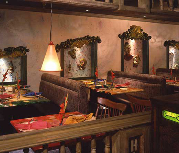 Rollick's carnival restaurant-bar with table top kinetic displays, hand-painted vintage circus posters for live jazz lovers. Classic carnival restaurant style with festive surprising animated art designed by Carolyn Robbins Interiors