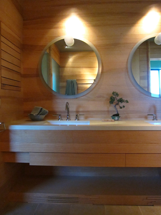 Modern Japanese esthetic with underlit floors and slate covered walls - Fong Interior design by Carolyn Robbins