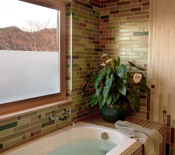 Modern Japanese esthetic with underlit floors and slate covered walls - Fong Interior design by Carolyn Robbins