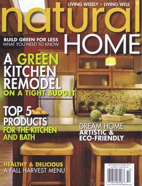 Noted kitchen interior blending sustainable bamboo, river rock, reflective dark granite and aqua glass tile for Japanese inspired seaside interior designed by Carolyn Robbins