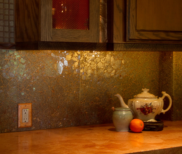 Warm kitchen details in copper tones and broken glass mosaic - Heeb Interior design by Carolyn Robbins