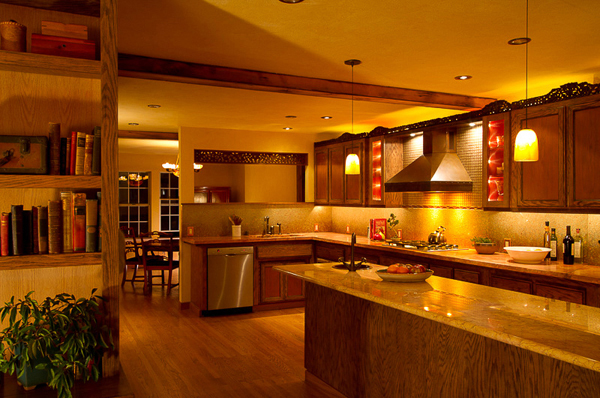 Warm kitchen details in copper tones and broken glass mosaic - Heeb Interior design by Carolyn Robbins