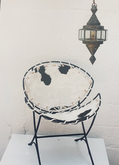 Cow hide laced iron chair ‘89 by carolyn robbins - Antares Miami