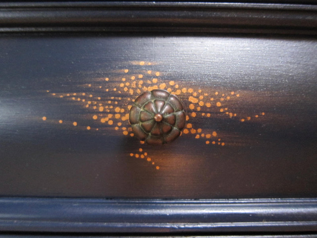Detail of celestial dresser by Carolyn Robbins
